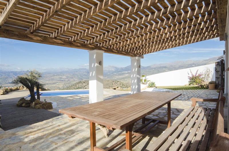 Shaded dining at Villa Chepita, Andalucia, Spain