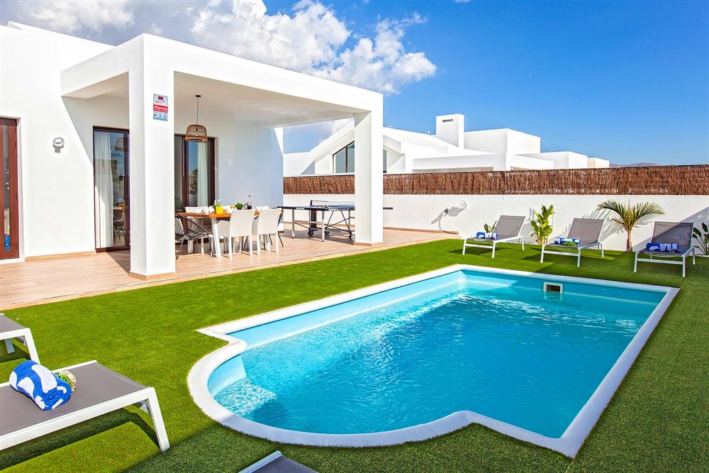 Garden and pool at Villa Cindy, Playa Blanca, Lanzarote