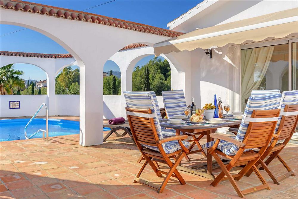 Alfresco dining, pool at Villa Cipreses, Frigiliana, Andalucia