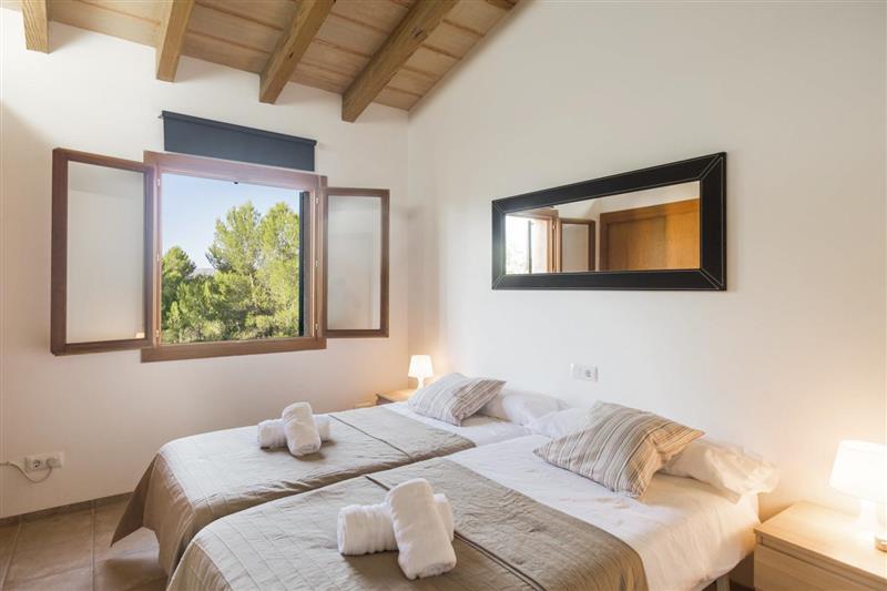 Twin bedroom (photo 2) at Villa Hortensia, Arta, Spain