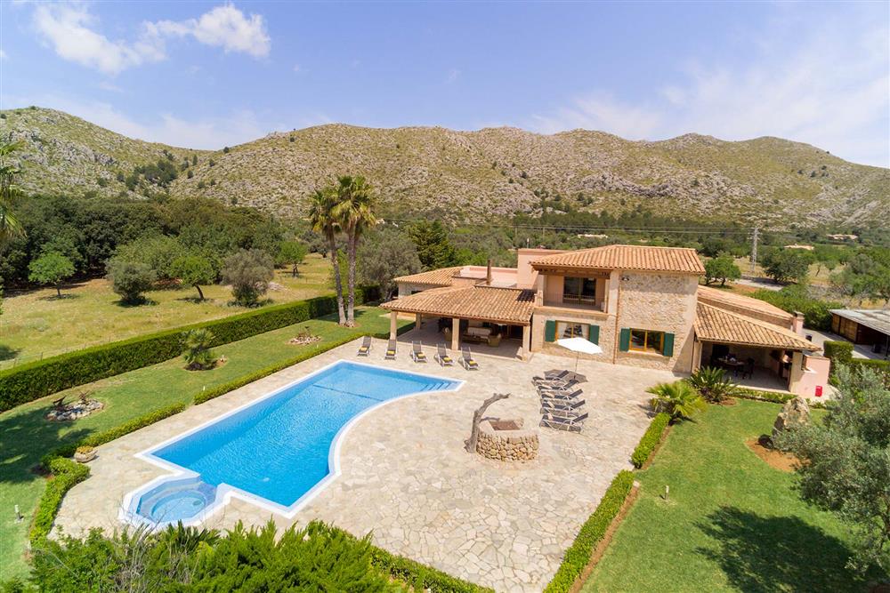 Aerial view, villa exterior, pool at Villa Les Oliveres, Puerto Pollensa, Mallorca