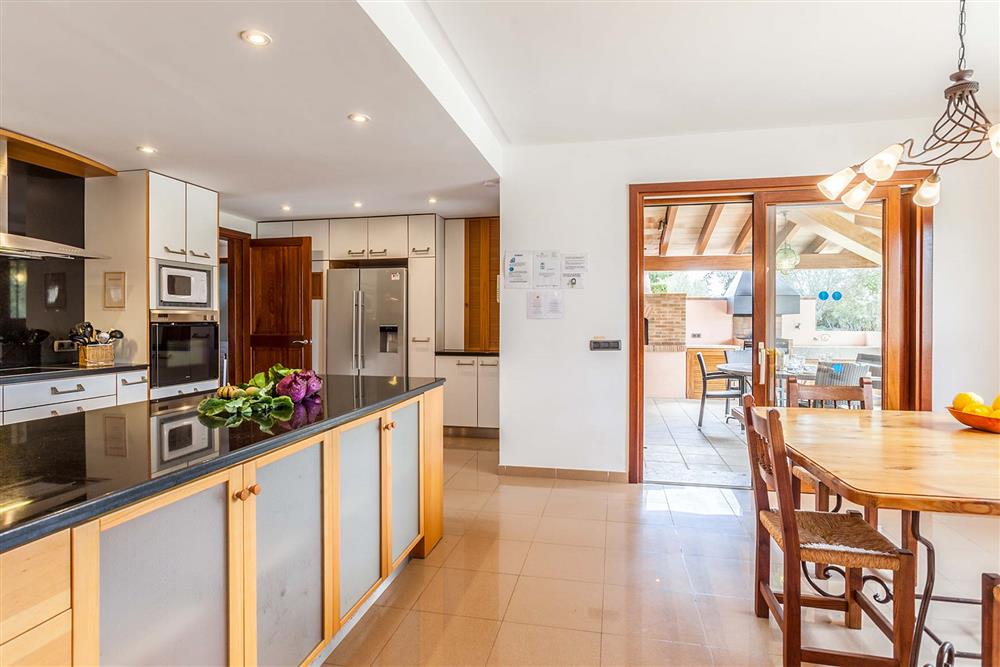 Kitchen, dining room, terrace at Villa Les Oliveres, Puerto Pollensa, Mallorca