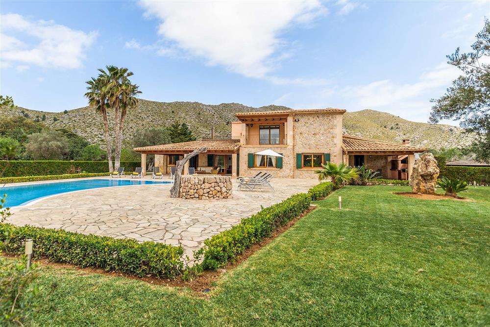 Villa exterior, garden at Villa Les Oliveres, Puerto Pollensa, Mallorca