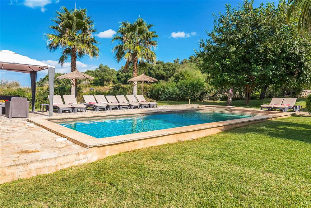 Pool, seating area at Villa Les Roques de can Guixe, Pollensa, Mallorca