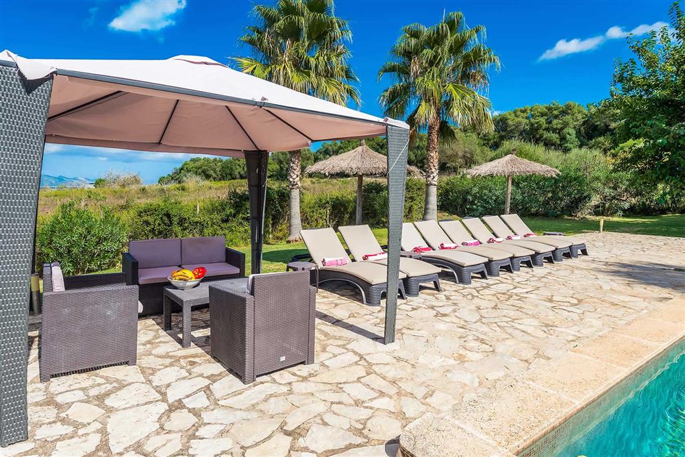 Seating area, sunloungers at Villa Les Roques de can Guixe, Pollensa, Mallorca