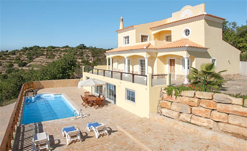 Swimming pool, garden and setting of the villa at Villa Mar, Estoi Algarve, Portugal
