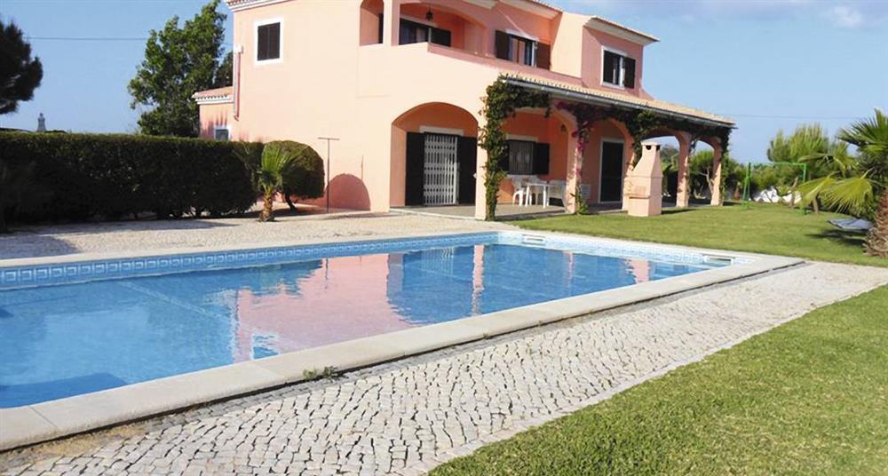 Swimming pool and garden at Villa Sanuno, Vale De Parra, Algarve