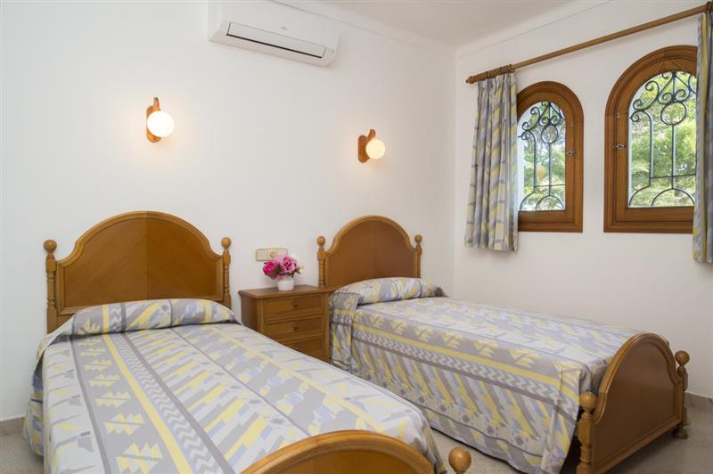 Twin bedroom at Villa Valenti, Cala dOr, Spain