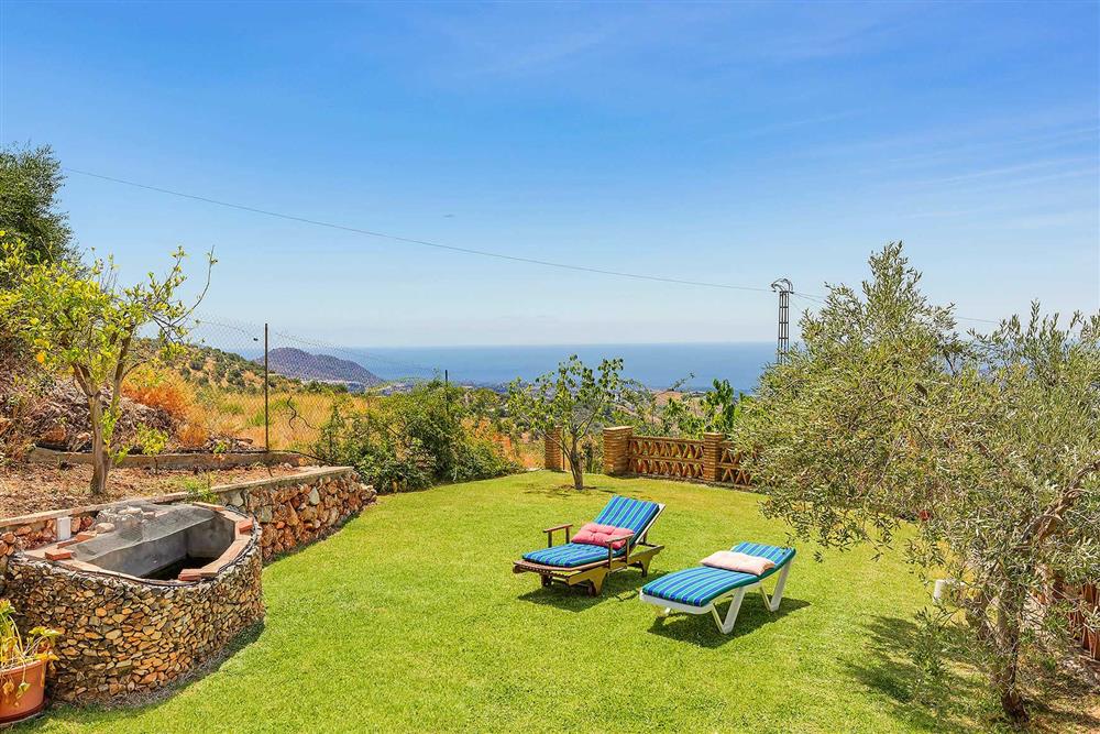 View, garden, sunloungers at Villa Vista Azul, Frigiliana, Andalucia