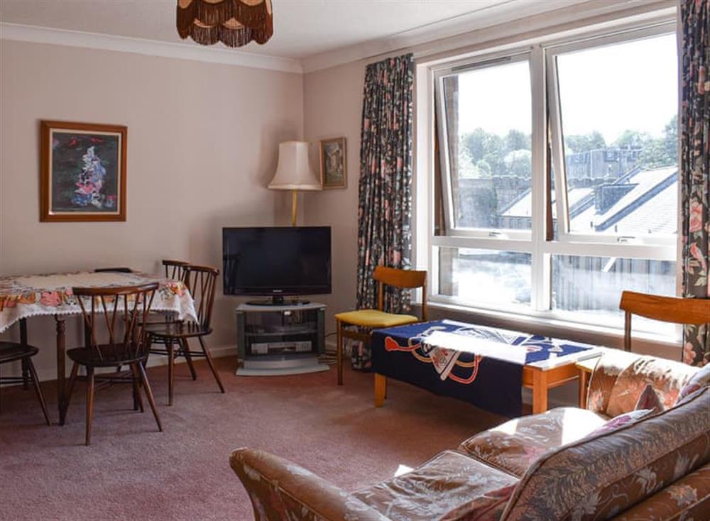 Living room with dining area at Village Apartment in Edinburgh, Midlothian