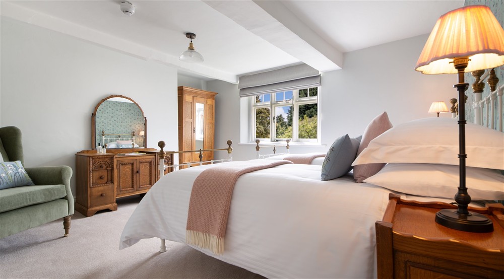 The first twin bedroom at Village Farmhouse in Altrincham, Cheshire