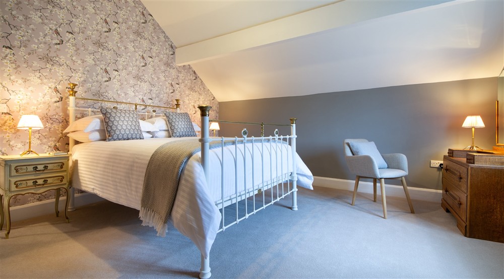 The fourth king-size bedroom at Village Farmhouse in Altrincham, Cheshire
