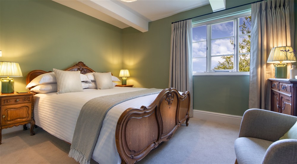 The second king-size bedroom at Village Farmhouse in Altrincham, Cheshire