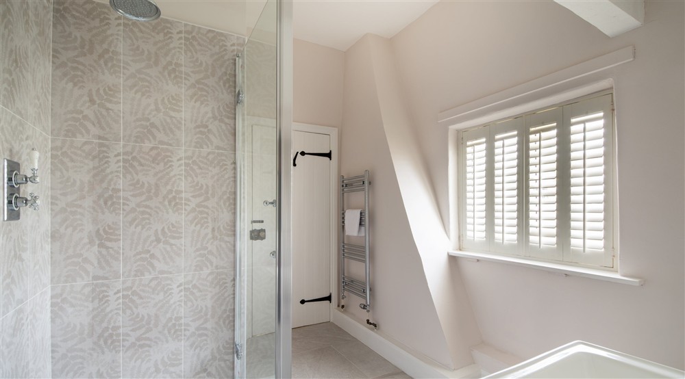 The shower room at Village Farmhouse in Altrincham, Cheshire