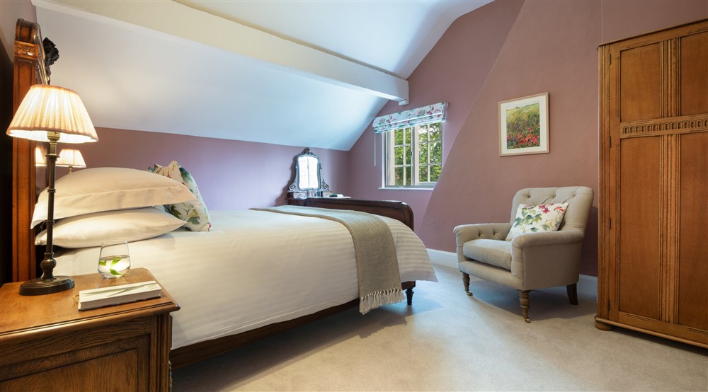The third king-size bedroom at Village Farmhouse in Altrincham, Cheshire