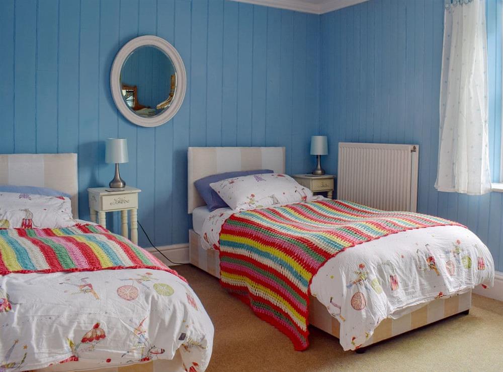 Twin bedroom at Vinca Cottage in Burniston, near Scarborough, North Yorkshire
