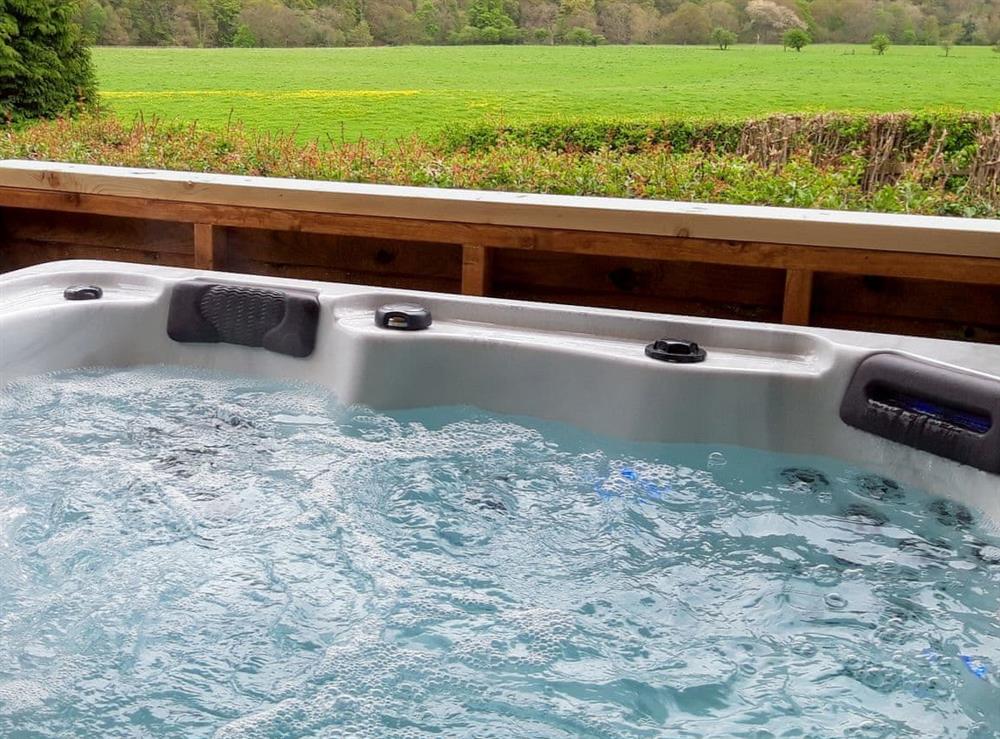 Relaxing hot tub at Hadrian Lodge, 