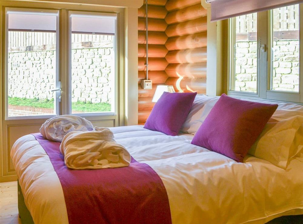 Relaxing double bedroom at Vindolanda Lodge, 