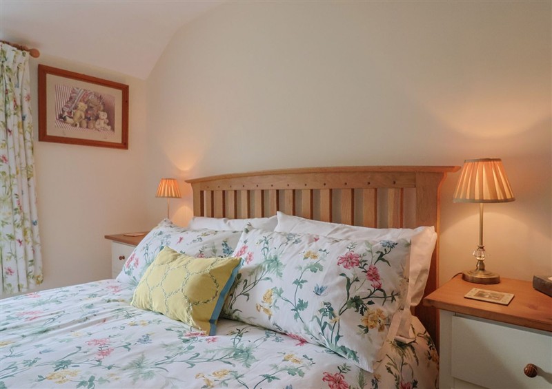 A bedroom in Vine Cottage (photo 4) at Vine Cottage, Burton Bradstock