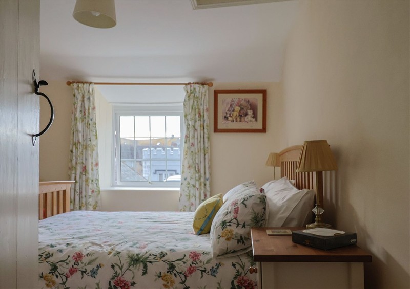 A bedroom in Vine Cottage at Vine Cottage, Burton Bradstock