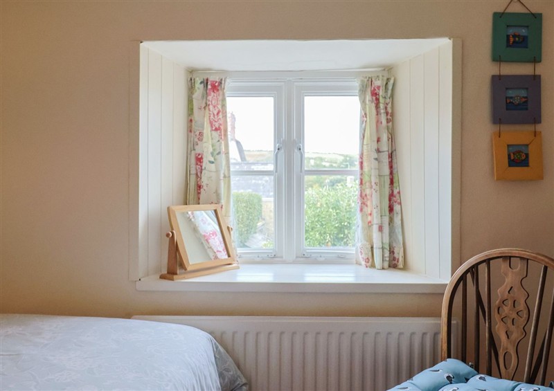 This is a bedroom at Vine Cottage, Burton Bradstock