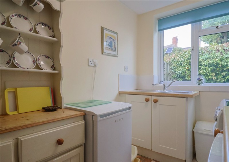 This is the kitchen (photo 2) at Vine Cottage, Burton Bradstock