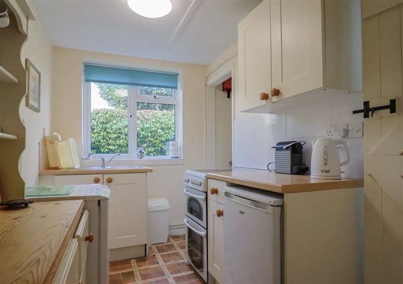 This is the kitchen (photo 3) at Vine Cottage, Burton Bradstock