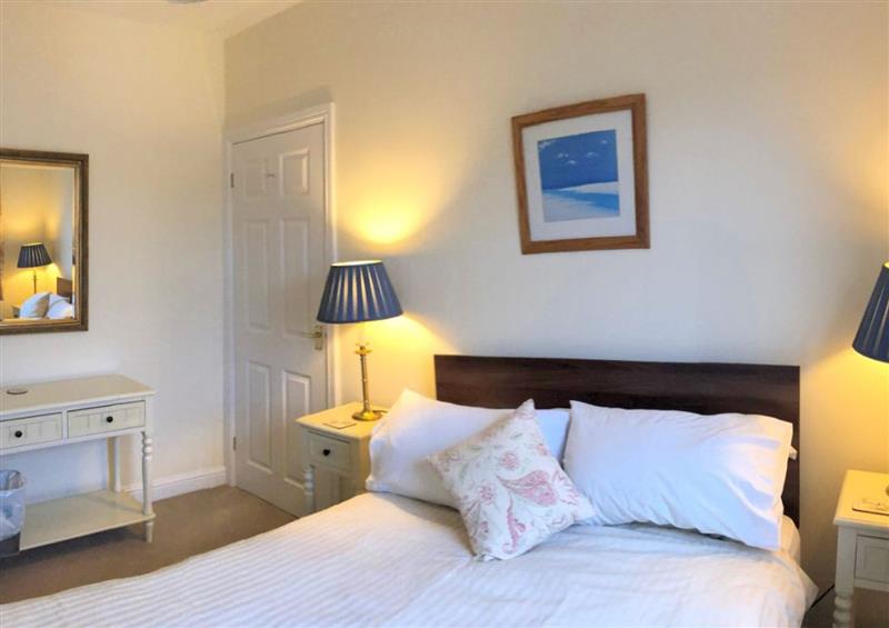 A bedroom in Vine Cottage at Vine Cottage, Charmouth
