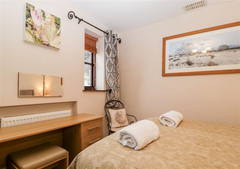 This is a bedroom at Vine Cottage, Llanwenarth near Abergavenny