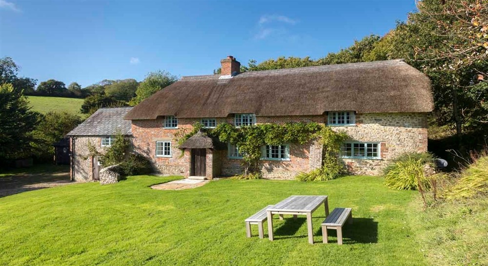 Exterior frontage of Shedbush Farmhouse, nr Bridport, Dorset at Vineyard Farm Cottage in Wareham, Dorset