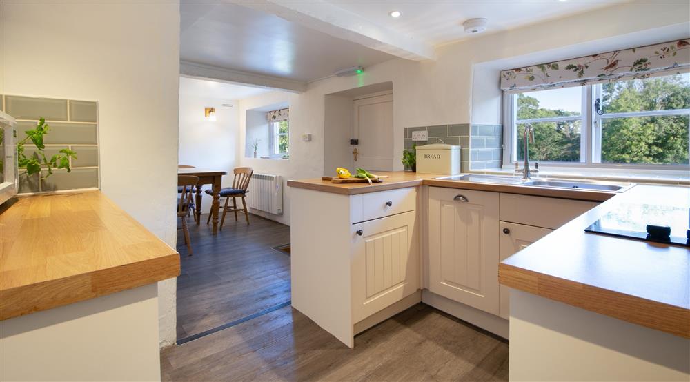 The kitchen and dining room at Vineyard Farm Cottage in Wareham, Dorset