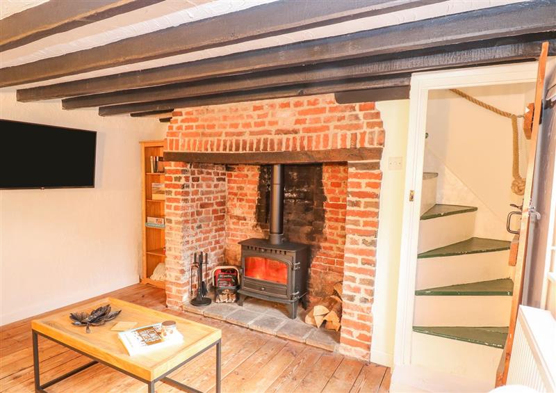 Relax in the living area at Vintners Cottage, Freethorpe near Reedham