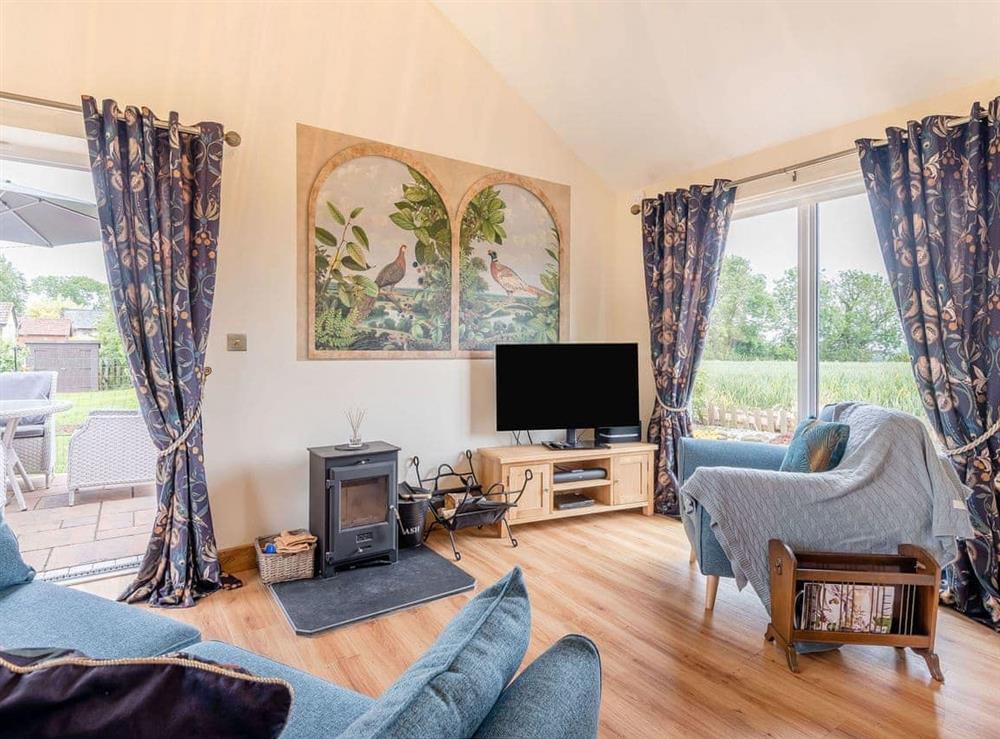 Open plan living space at Violet Cottage in Herford, Herefordshire