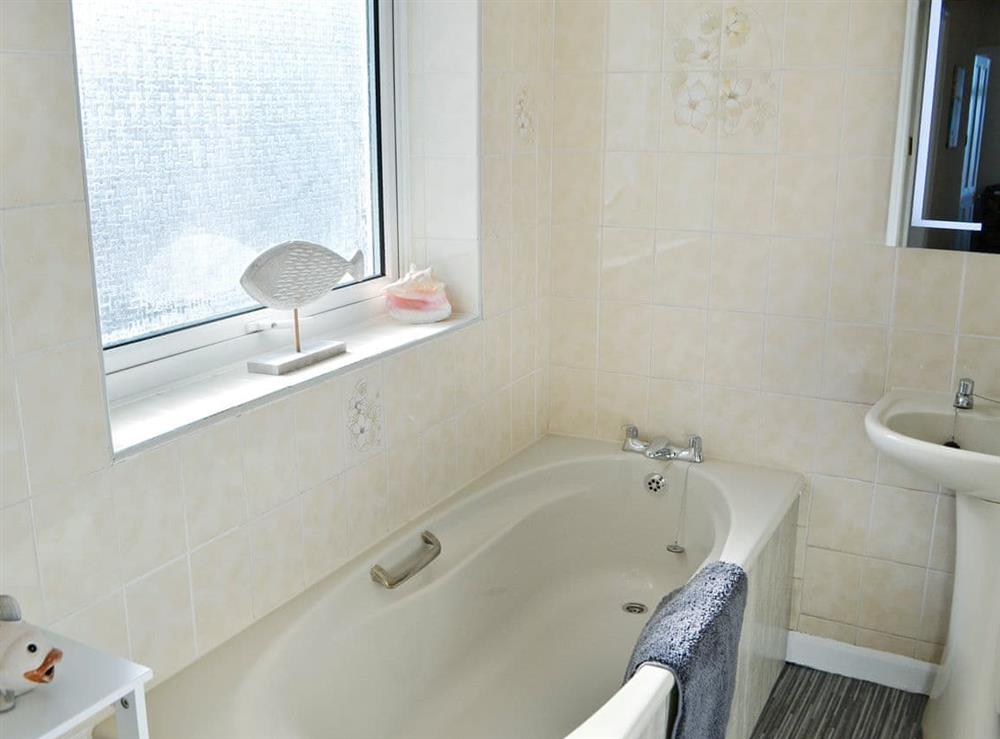 Bathroom with bath and shower cubicle (photo 2) at Violet Cottage in Newbiggin-by-the-Sea, Northumberland