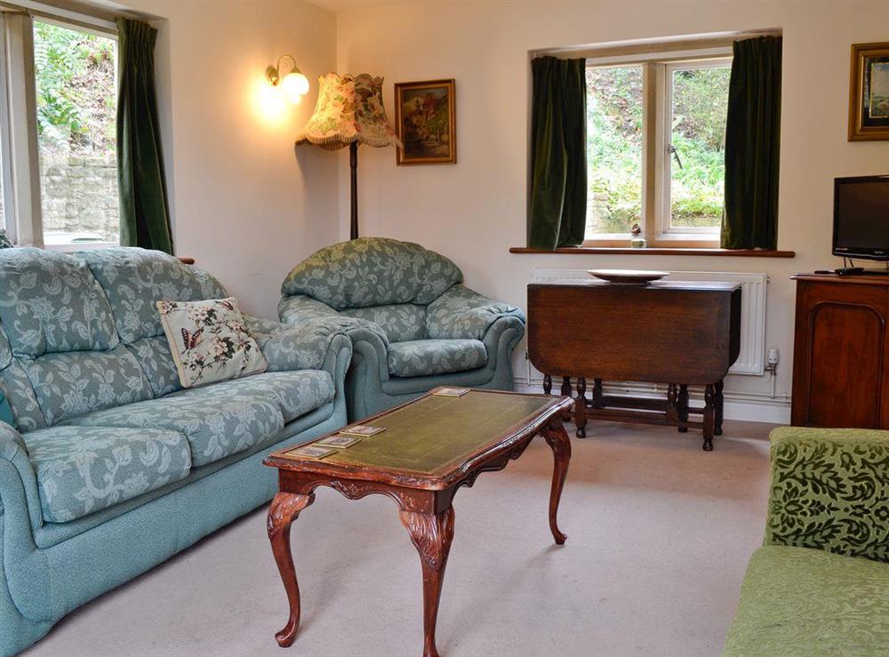 Living room at Violet Cottage in Pitchcombe, near Painswick, Gloucestershire
