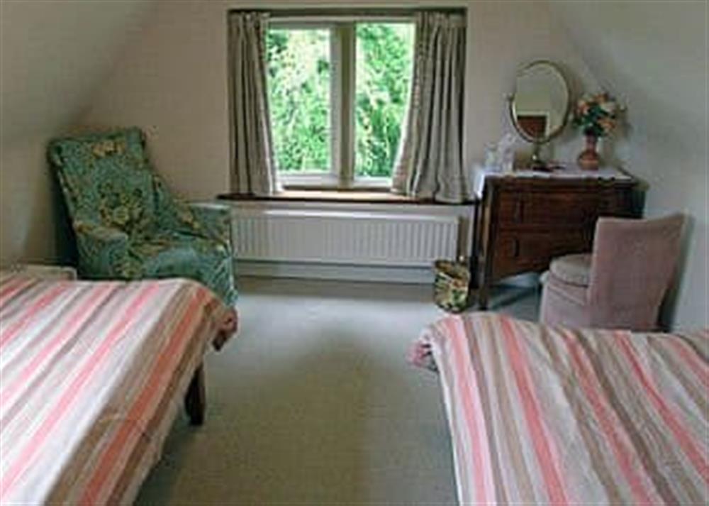 Twin bedroom at Violet Cottage in Pitchcombe, near Painswick, Gloucestershire