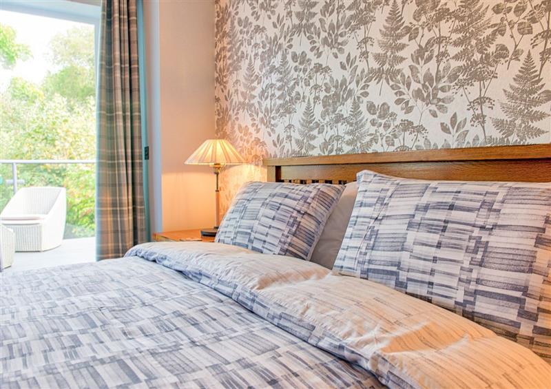 One of the bedrooms at Vyrnwy Lakeside Apartment, Bala