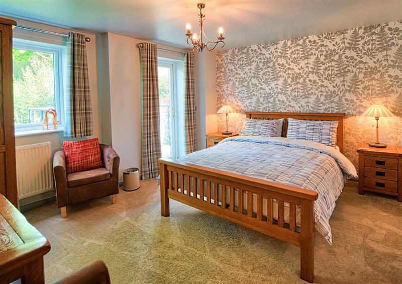 This is the bedroom at Vyrnwy Lakeside Apartment, Bala