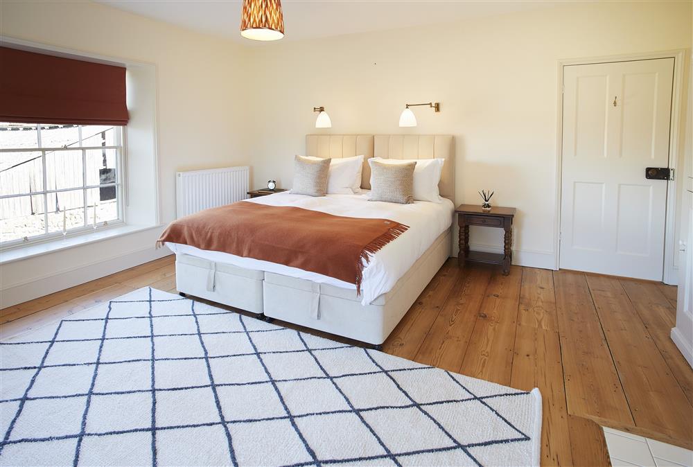 Bedroom two with 6’ super-king zip and link bed (photo 2) at Walesby House, Walesby