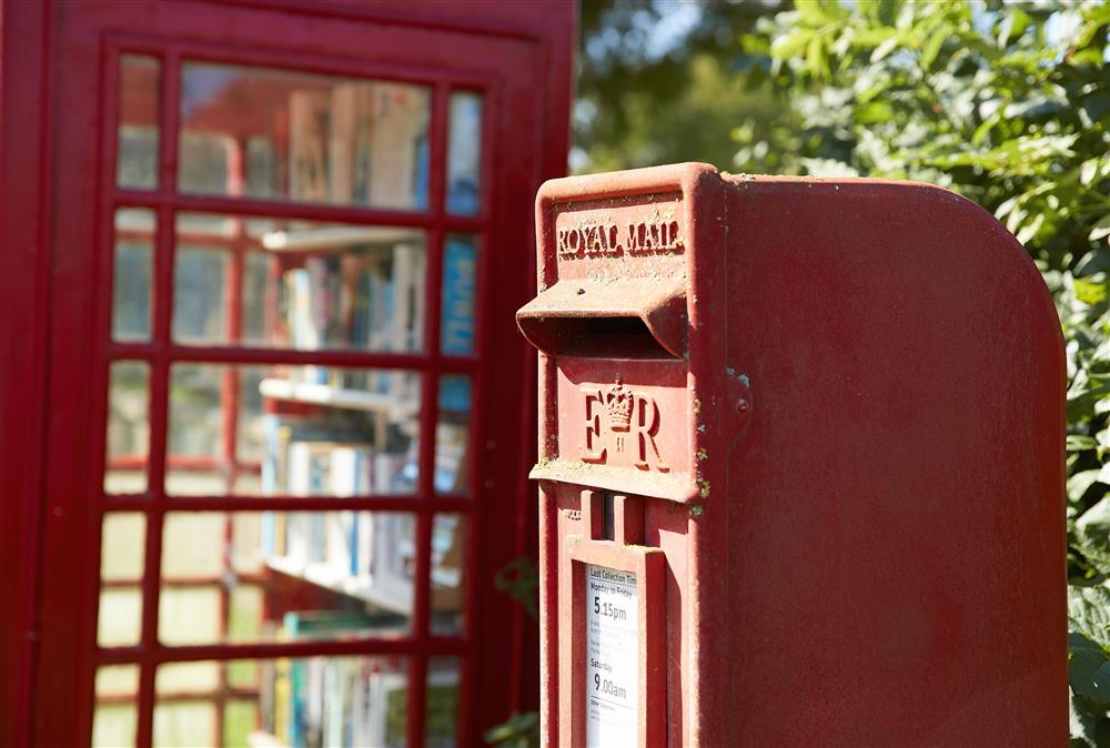 Nearby telephone box converted into a library for those avid readers