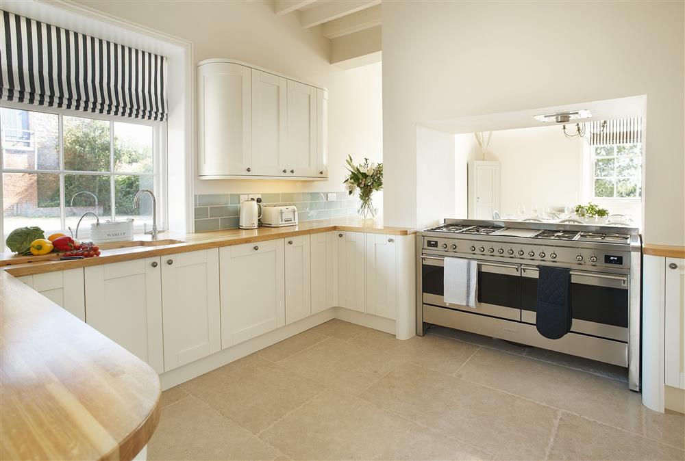 Well equipped kitchen leading through to dining area at Walesby House, Walesby