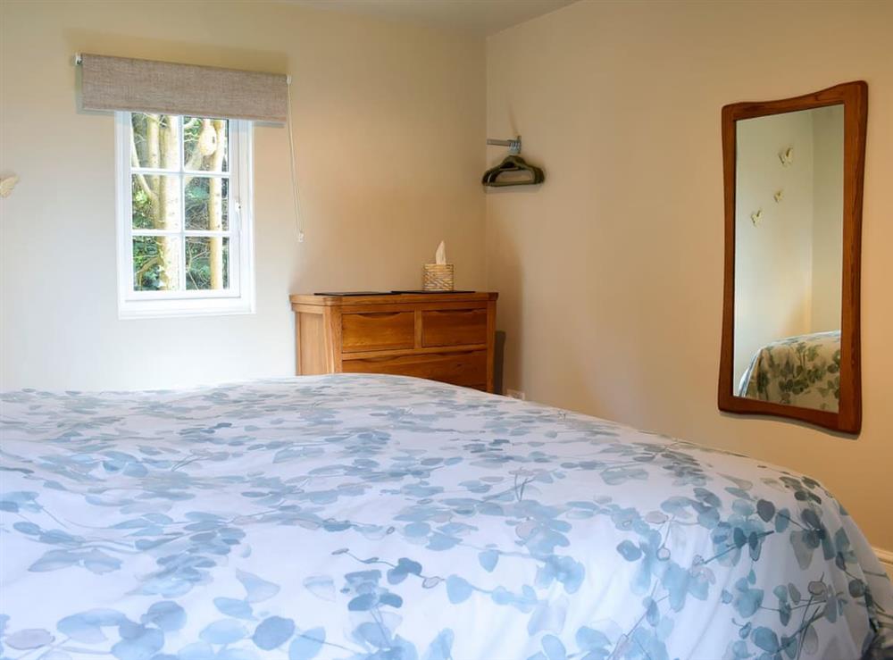 Comfortable bedroom with zip and link super kingsize bed (photo 2) at Walkers Lodge in Dormington, near Hereford, Herefordshire