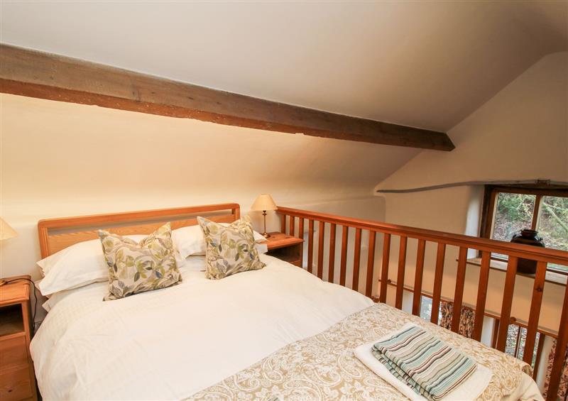 This is the bedroom at Walkmill Barn, Wentnor