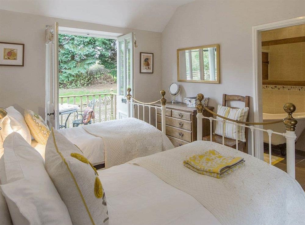 Charming twin bedroom with en-suite bathroom (photo 2) at Walkmill Lodge in Norbury, Nr Bishop’s Castle, Shropshire., Great Britain