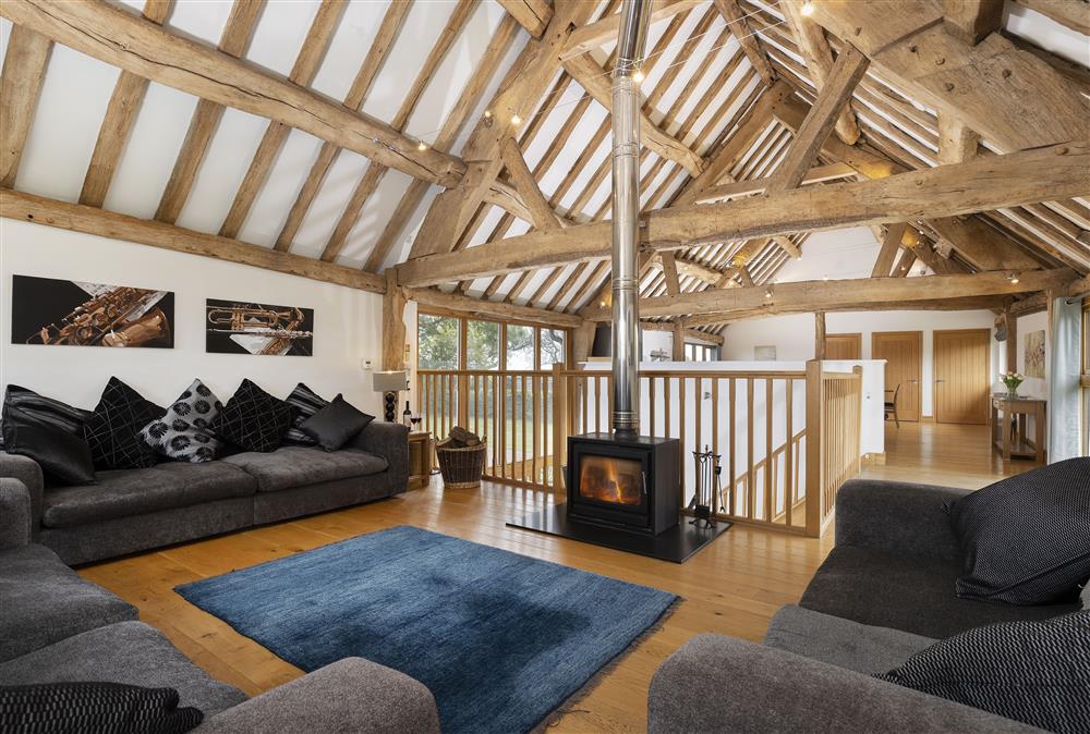 At the end of the living space is the sitting room with wood burning stove (photo 2) at Wall Hills Barn, Thornbury