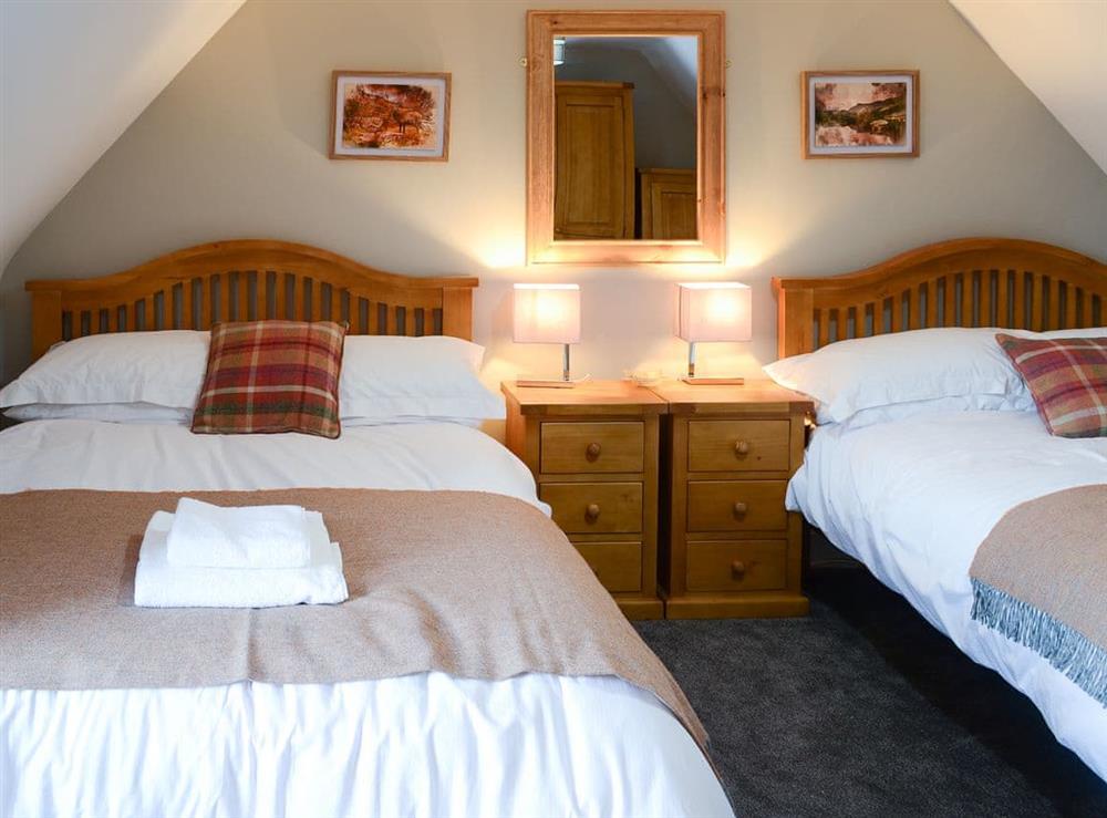 Lovely bedroom in the eaves at Wallace House in Dornoch, near Tain, Sutherland