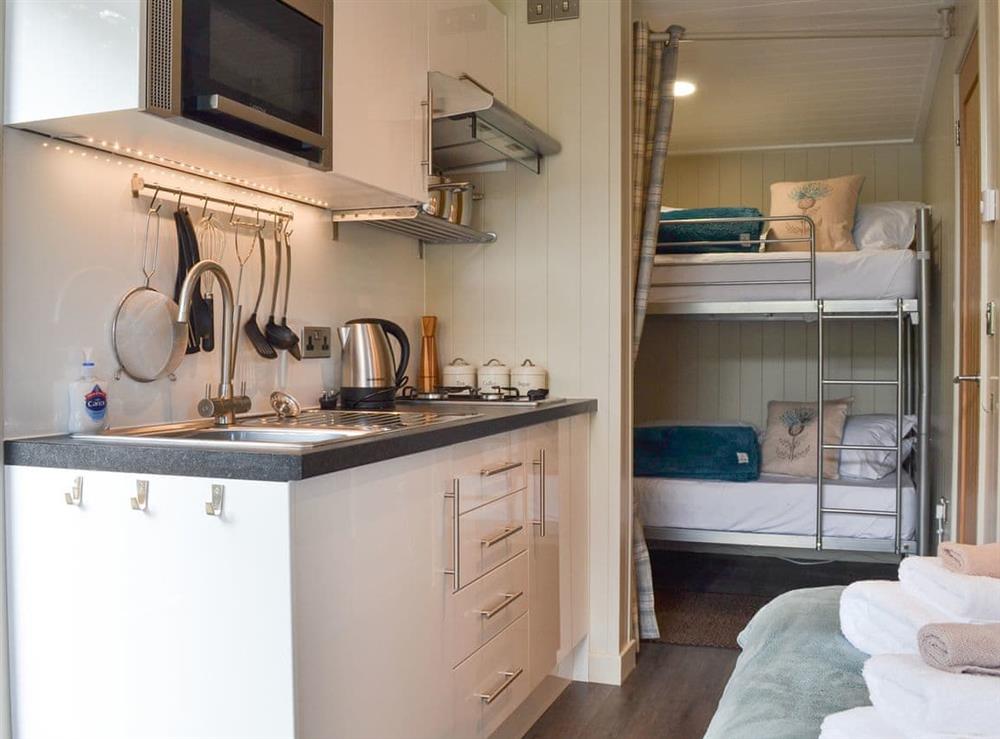 Kitchen and bunk bedroom at Lapwing, 