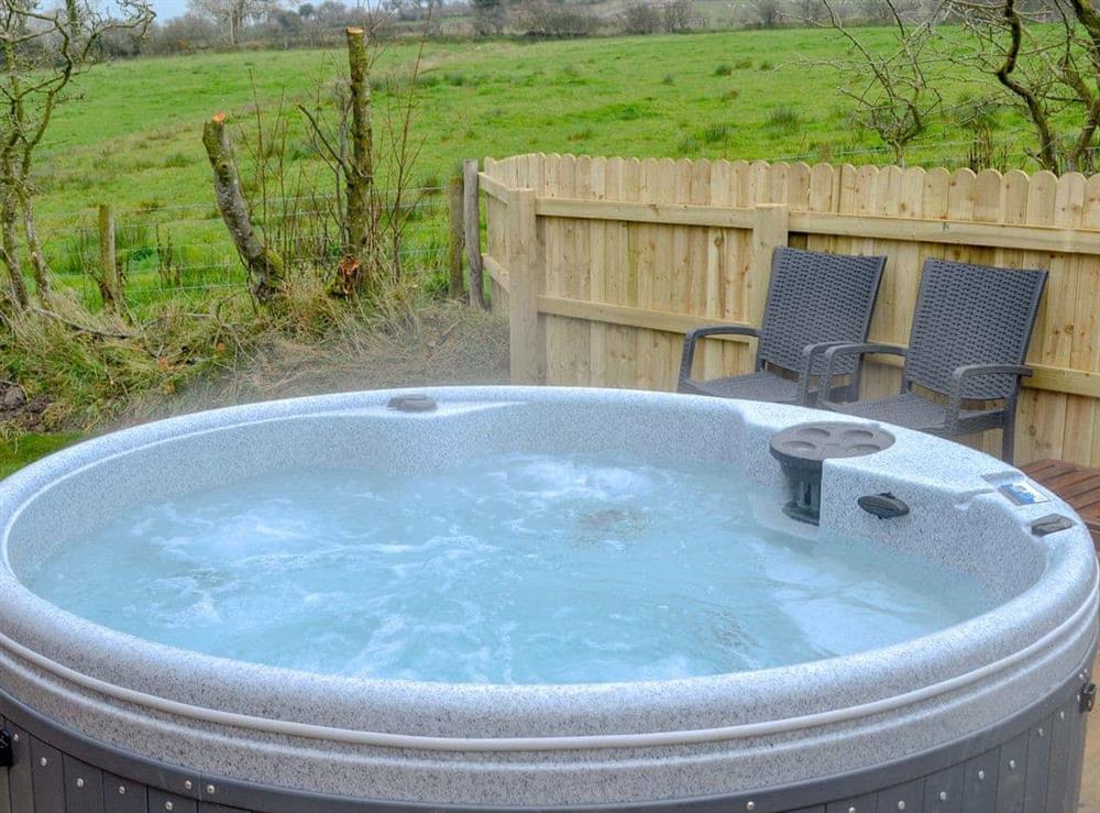 Relaxing private hot tub at Skylark Lodge, 