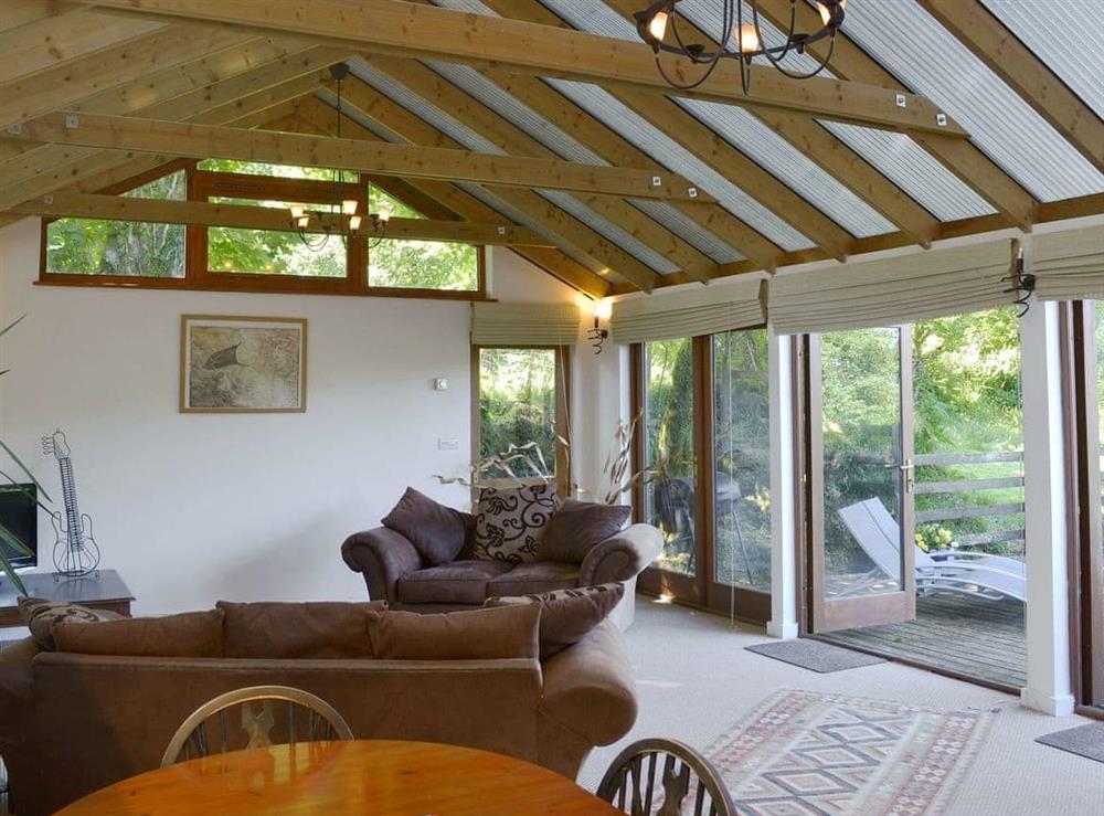 Light and bright living/ dining room at Wallhouse Barn in Bodmin, Cornwall