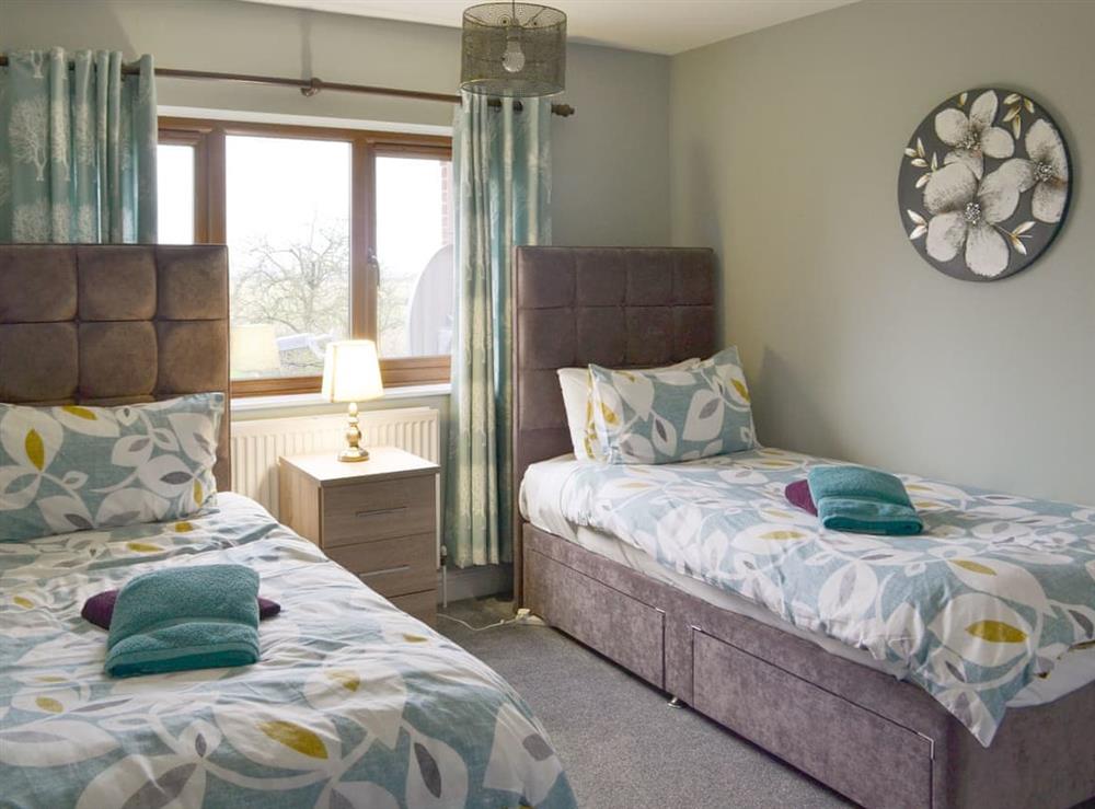 Twin bedroom at Carp Cottage, 